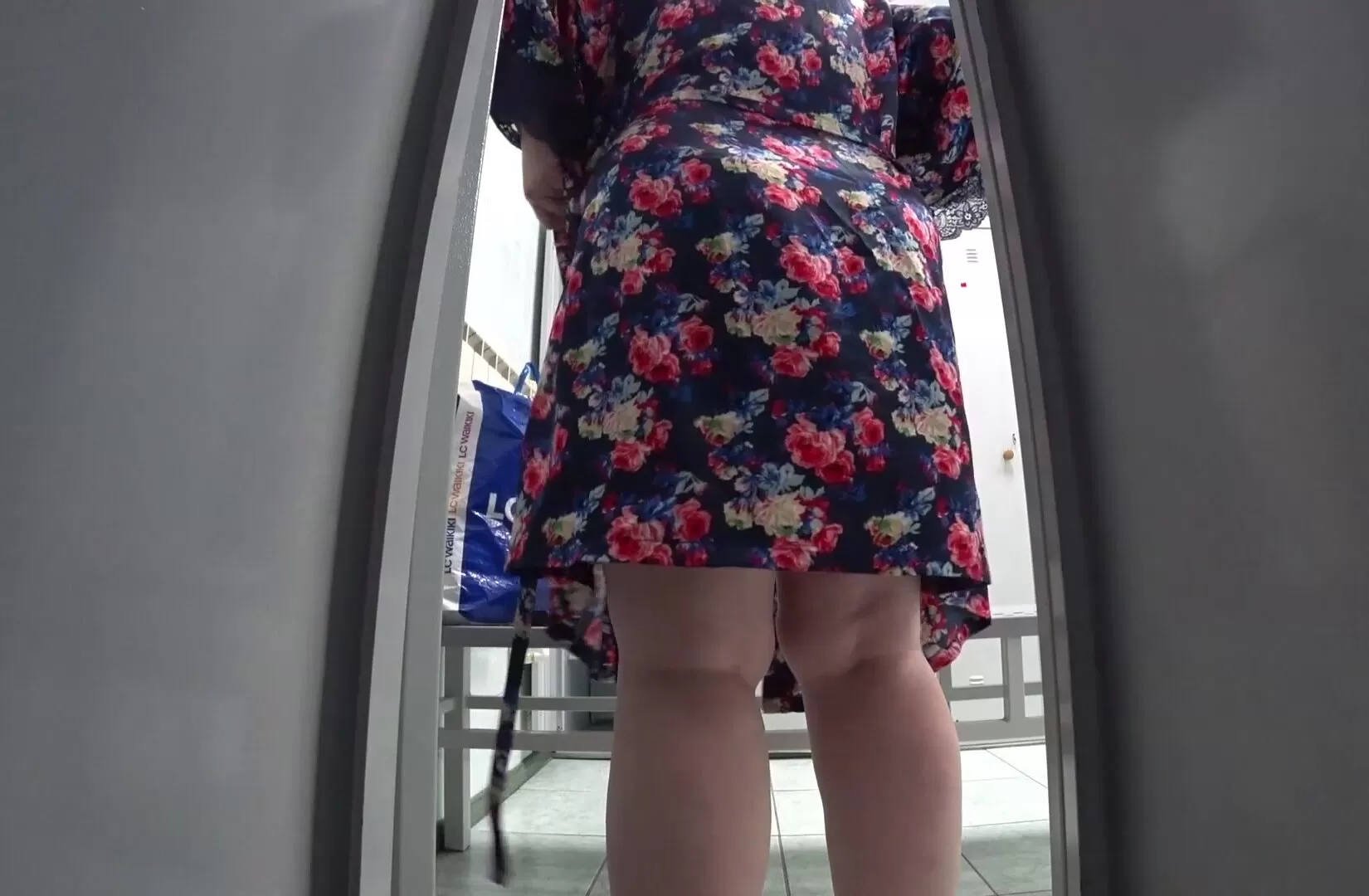 Hidden cam in the public locker room at the pool spying on a mature milf with a juicy ass, big boobs, hairy pussy and a plump belly. Amateur fetish picture image